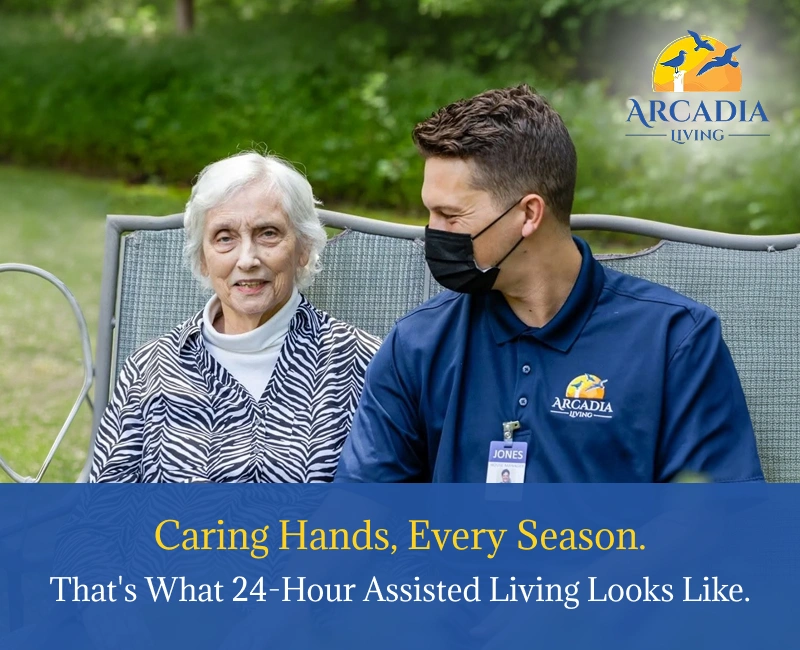 care staff assisting elderly resident indoors during summer at assisted living facility